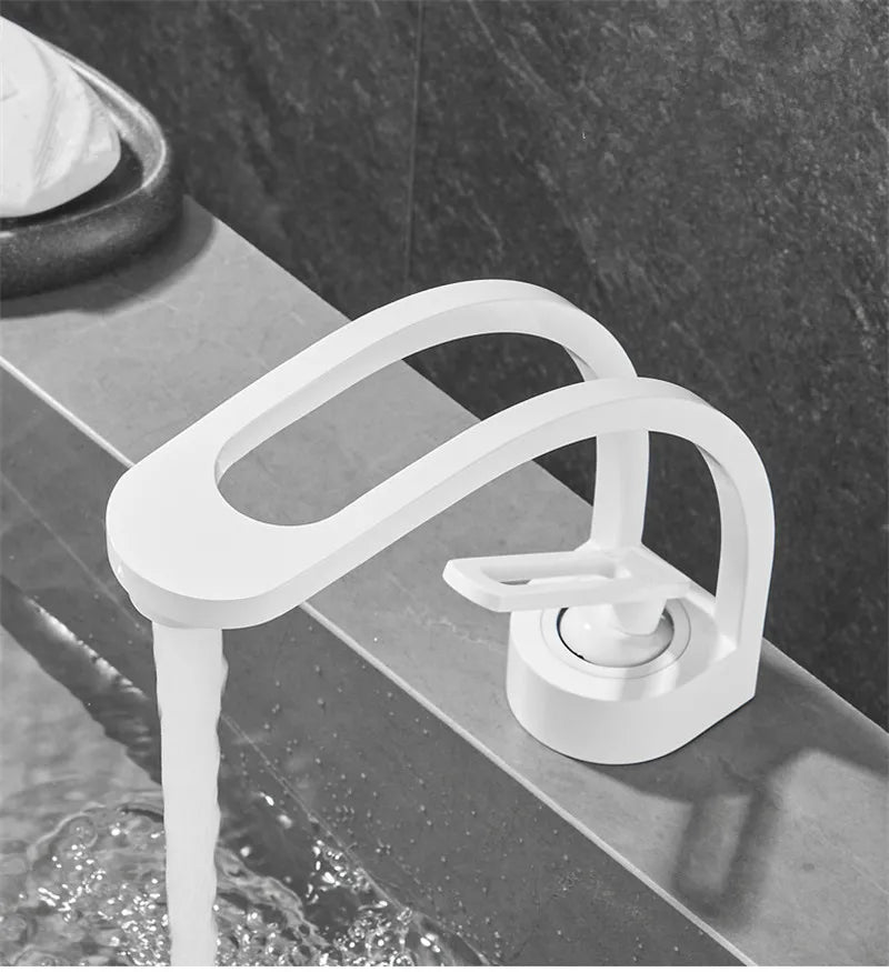 Single-handle bathroom basin faucet by MC THE BLACK DIAMOND, modern bath sink faucet with sleek design and chrome finish.