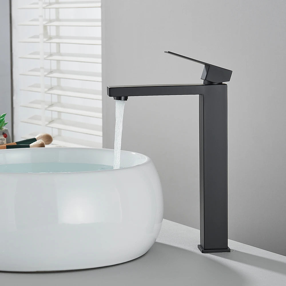 Matte black stainless steel bathroom sink faucet with hot and cold mixer, designed by MC THE BLACK DIAMOND