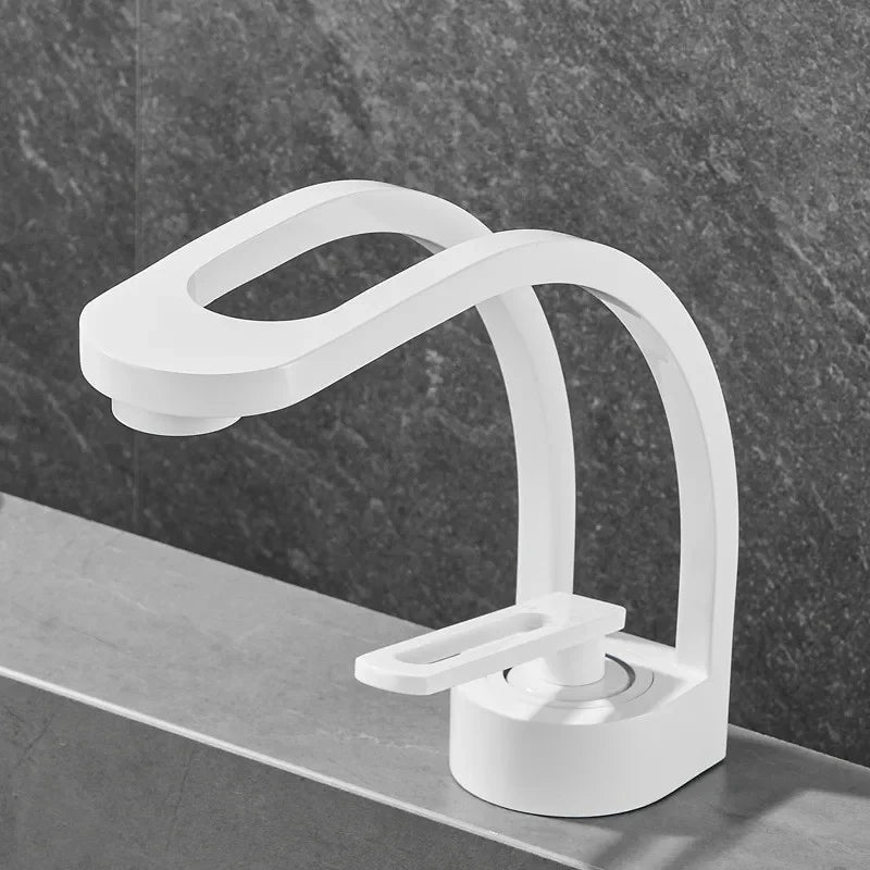 Single-handle MC THE BLACK DIAMOND bathroom basin faucet with sleek chrome finish, mounted on a white bathroom sink.