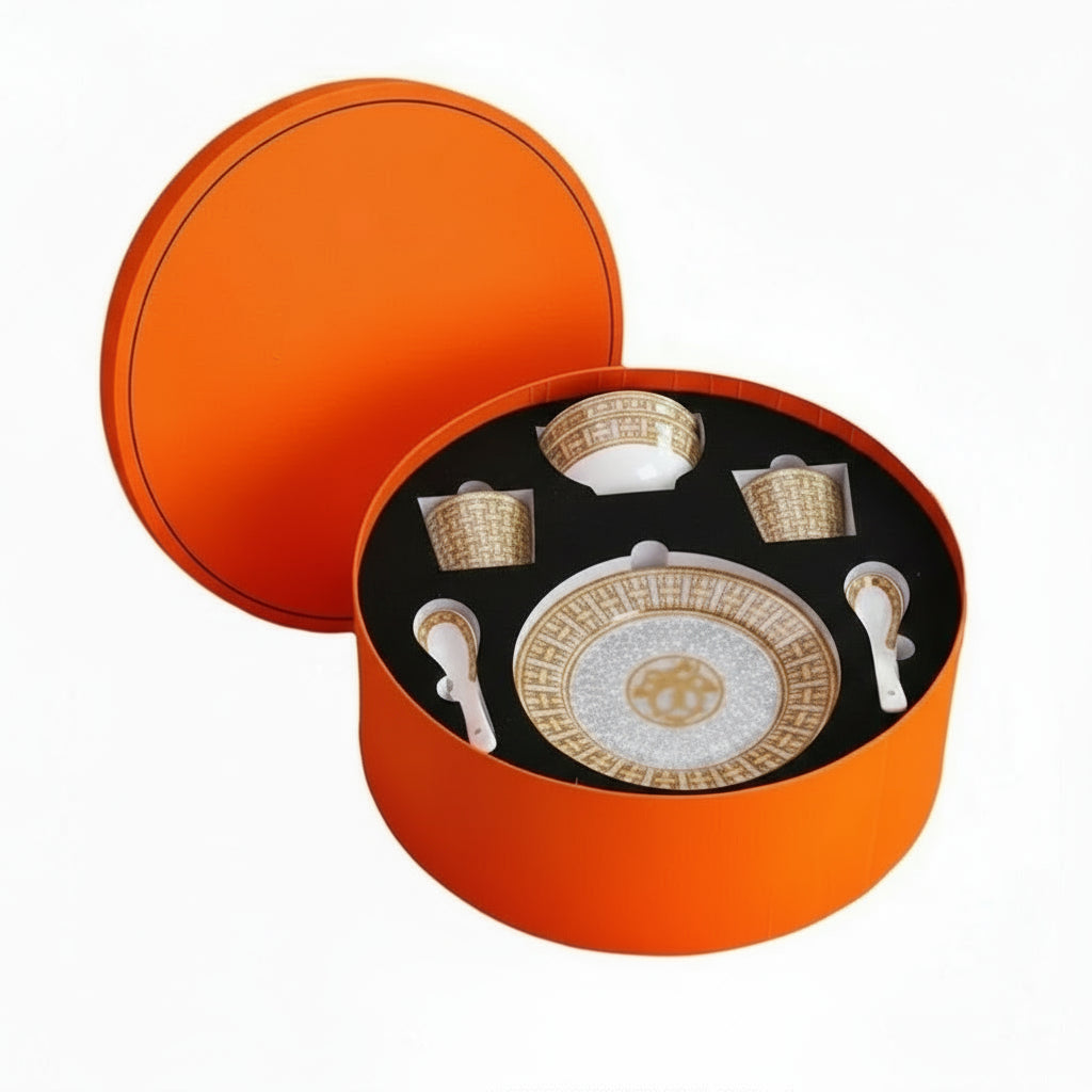Luxury gray art tableware set by MC THE BLACK DIAMOND with bowl, plate, and spoon for stylish drinkware presentation.