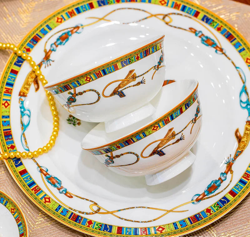 Family size dinnerware set by MC THE BLACK DIAMOND, includes various plates and bowls for comprehensive tableware.