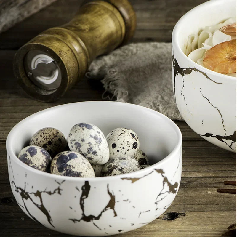 Ceramic bowl from MC THE BLACK DIAMOND's home dinnerware set, showcasing a smooth, round design perfect for tableware.