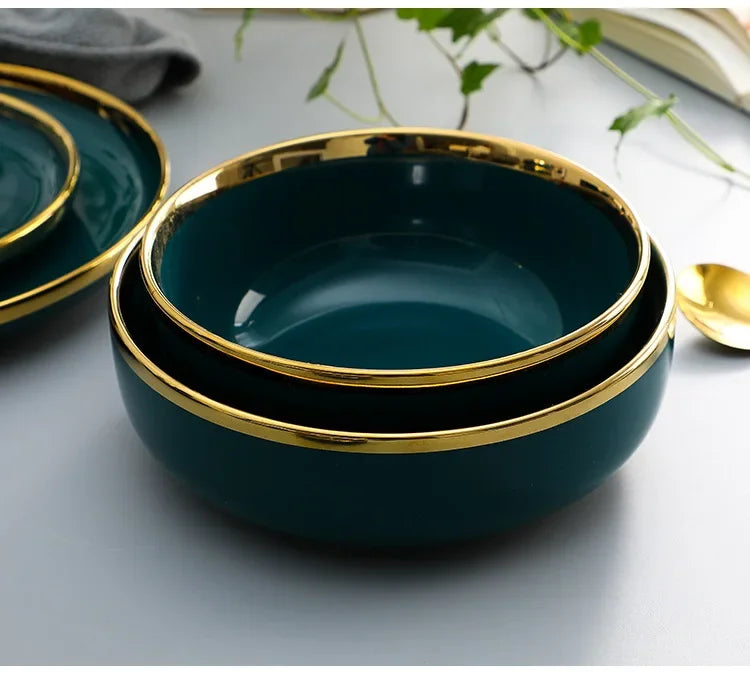 Set of green ceramic dinnerware by MC THE BLACK DIAMOND, including plates and bowls in a family dinnerware set.