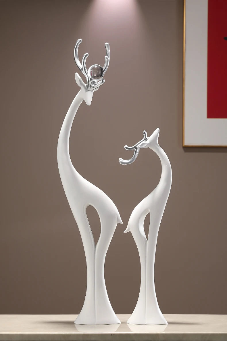Modern MC THE BLACK DIAMOND couple deer figurine ornament for home decor, ideal for living room, TV cabinet, or wedding gift.