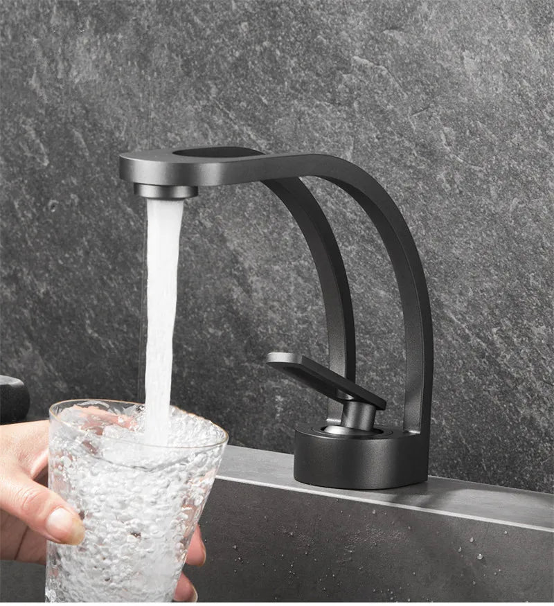 MC THE BLACK DIAMOND single-handle bathroom basin faucet installed on a modern bath sink with a sleek chrome finish.