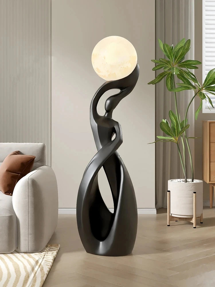 Large luminous sculpture for living room by MC THE BLACK DIAMOND, modern art statue with glowing, abstract design.