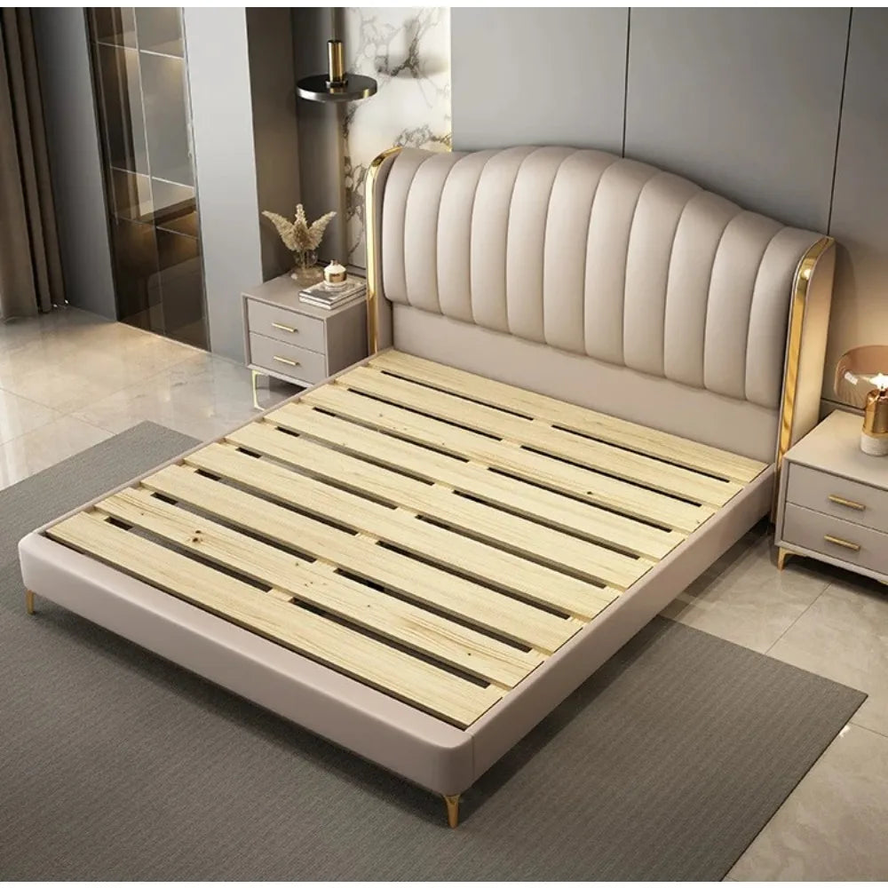 King size upholstered bed by MC THE BLACK DIAMOND featuring a modern plush headboard and sleek wooden legs for a stylish bedroom look.