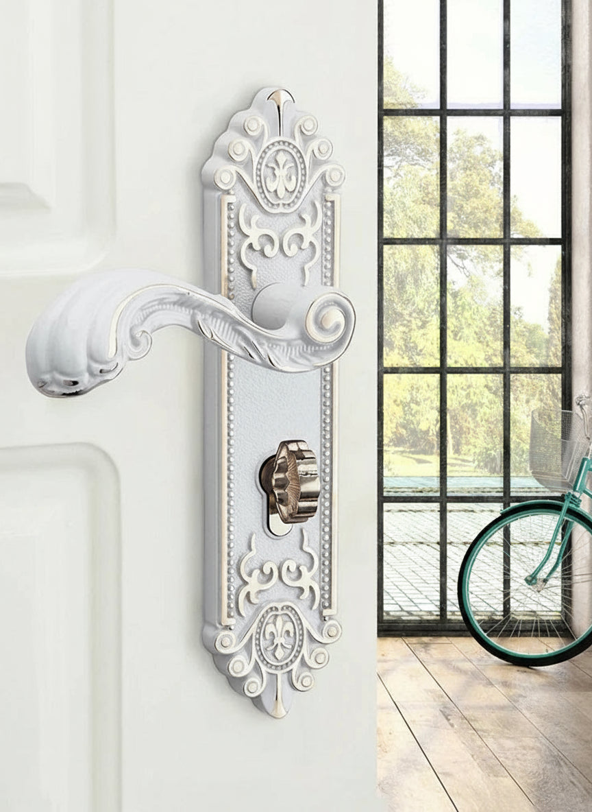 Ivory white gold door lock with keys and handle, security home decor by MC THE BLACK DIAMOND, shown on a door.