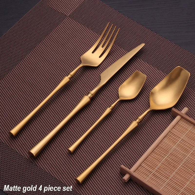 Matte stainless steel dinnerware set with black, gold, and silver finishes from 𝕄𝕔 𝕋𝕙𝕖 𝔹𝕝𝕒𝕔𝕜 𝔻𝕚𝕒�