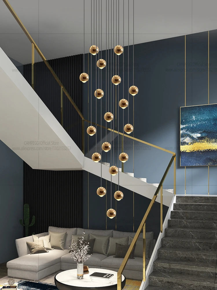 Modern MC THE BLACK DIAMOND LED staircase pendant light hanging in a living room with sleek design and warm illumination.