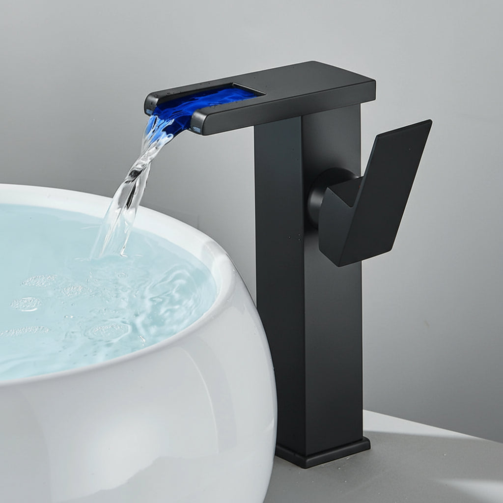 Black brass waterfall LED bathroom sink faucet with hot and cold mixer, designed for modern bath sinks by MC THE BLACK DIAMOND.