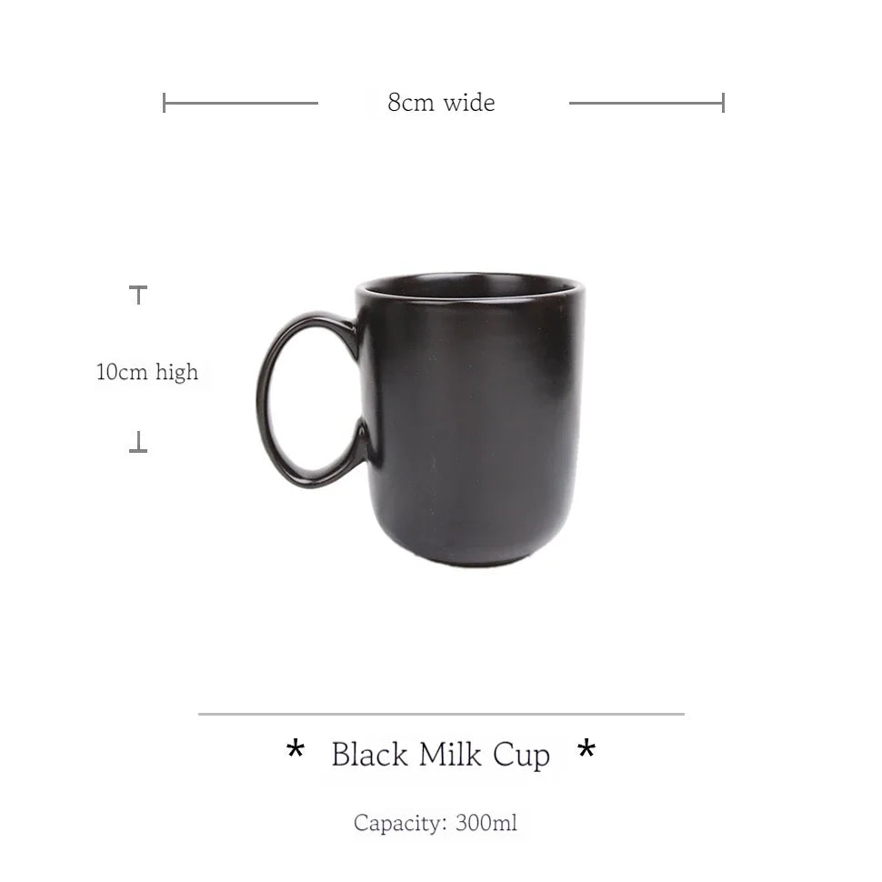 Deep black family dinner set by MC The Black Diamond, including plates and bowls with sleek modern design.