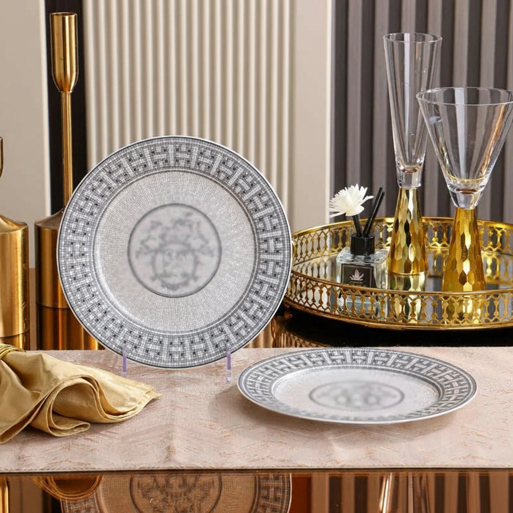 Luxury gray art tableware set by MC THE BLACK DIAMOND, includes bowl, plate, and spoon, displayed on a clean surface.
