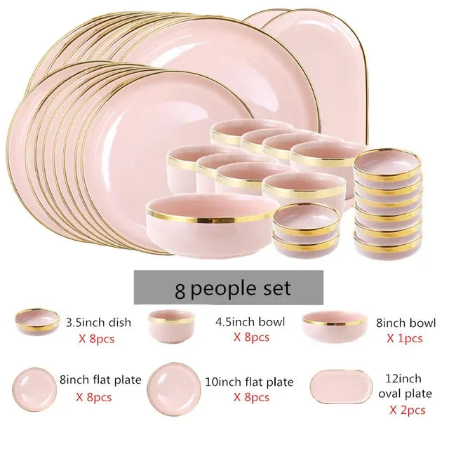 Bright white and pink porcelain plates set with gold accents from MC THE BLACK DIAMOND, ideal for elegant kitchen table settings.
