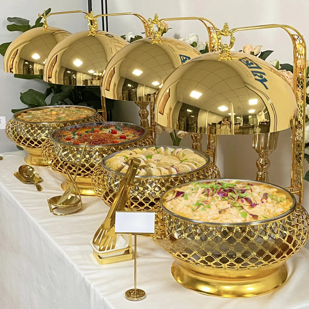 Stainless steel MC THE BLACK DIAMOND hot pot buffet warmer chafing dish for catering, with hanging design and multiple compartments.