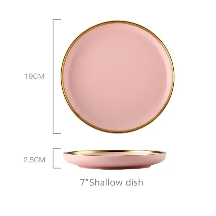 Set of ceramic dinnerware from MC THE BLACK DIAMOND, including plates and bowls for kitchen table use.