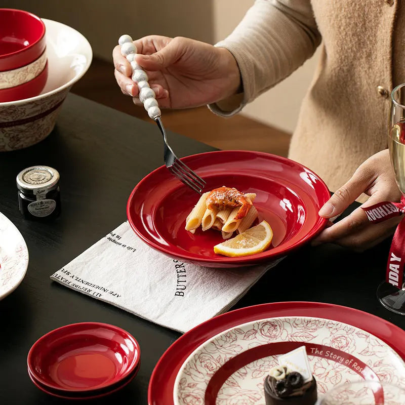 Red retro ceramic porcelain dinnerware set by MC THE BLACK DIAMOND, featuring elegant plates and bowls for luxurious dining.