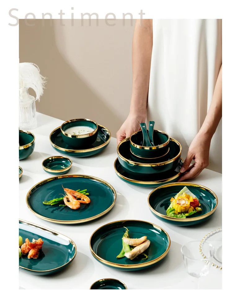 Dark green ceramic cutlery bowls set with gold accents, featuring rice bowls and porcelain dishes for kitchen use.