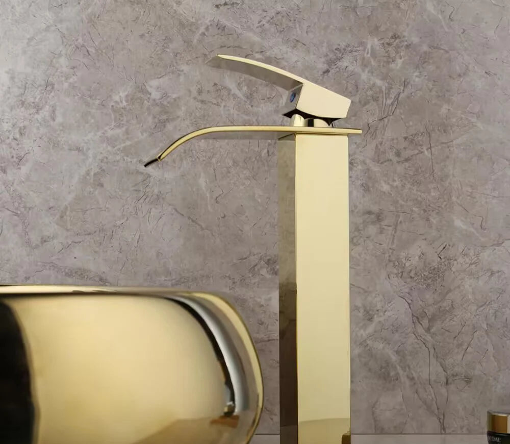 Gold waterfall vessel sink and faucet set by MC THE BLACK DIAMOND, modern bathroom fixture with sleek design.