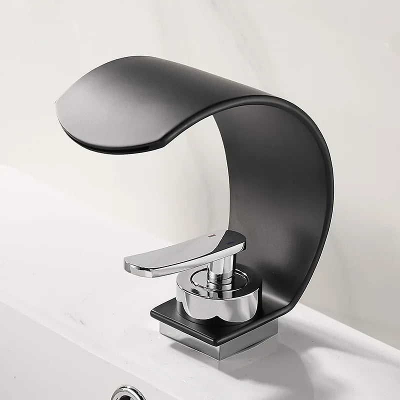 Black and white hot and cold water hydrant iron bathroom sink faucet by MC THE BLACK DIAMOND, shown in a modern bathroom setting.