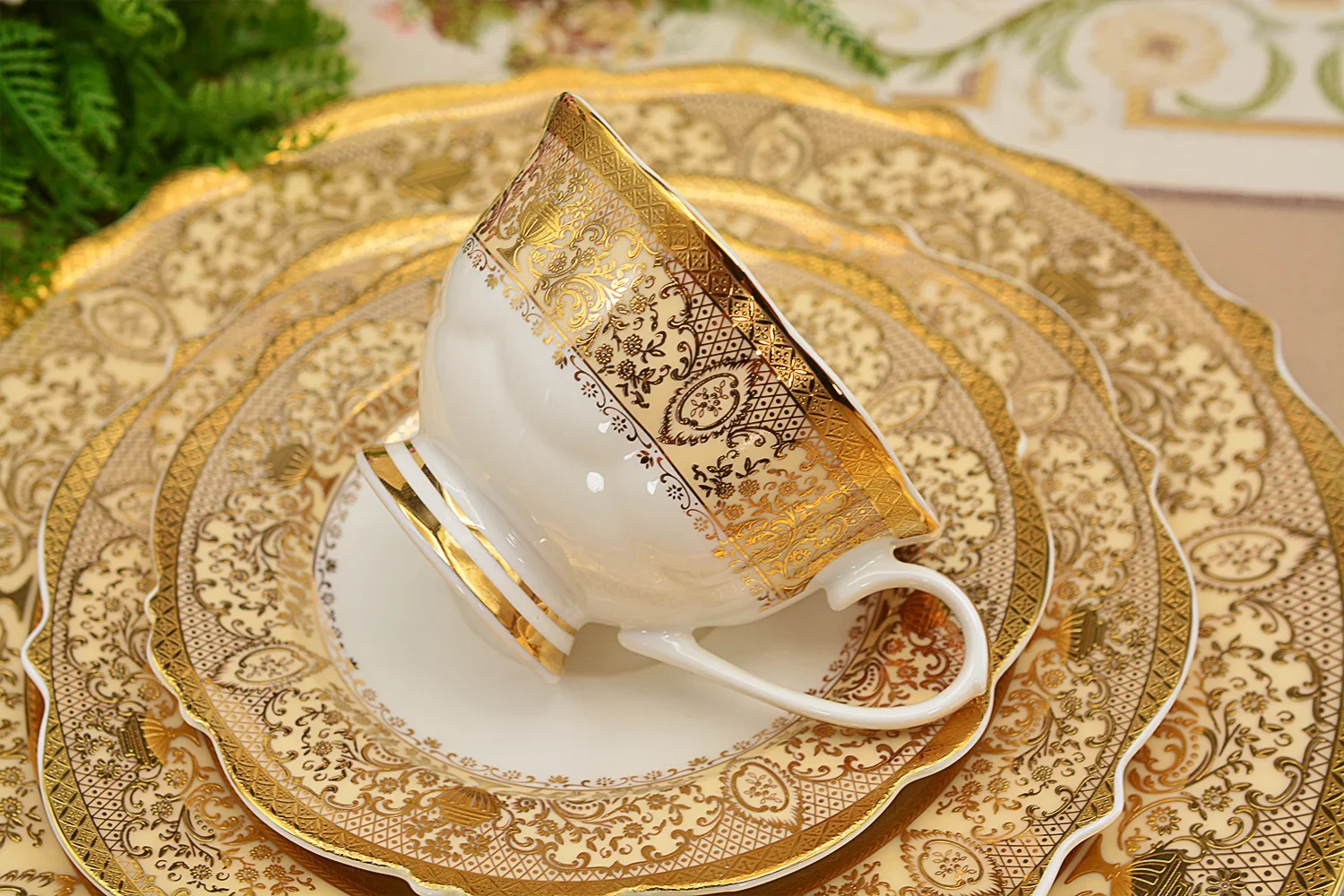 Luxury MC THE BLACK DIAMOND family size dinnerware set with matching plates and bowls arranged on a table.