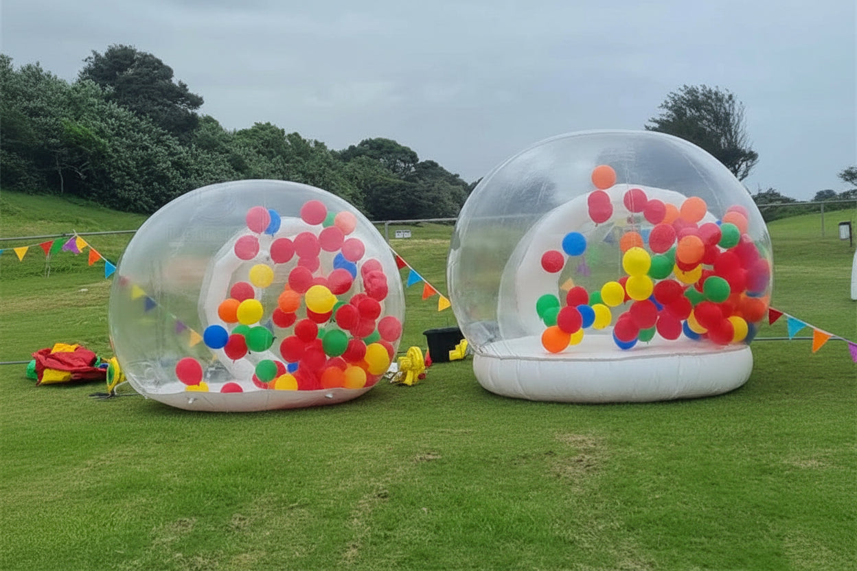 Transparent inflatable crystal dome bubble room for kids, large inflatable bouncer by MC THE BLACK DIAMOND, with clear walls and playful interior.