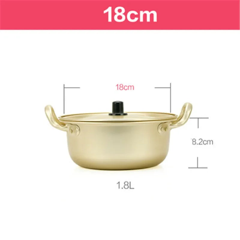 Gold aluminum stock pot from MC THE BLACK DIAMOND, ideal for hot cooking and versatile kitchen cookware.