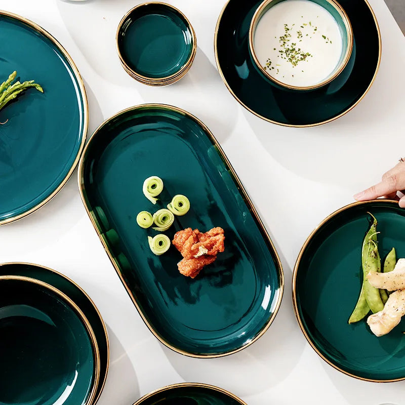 Dark green ceramic cutlery bowls set with gold-plated accents, including rice bowls and plates, by 𝕄𝕔 𝕋𝕙𝕖 𝔹𝕝𝕒𝕔𝕜 𝔻𝕚