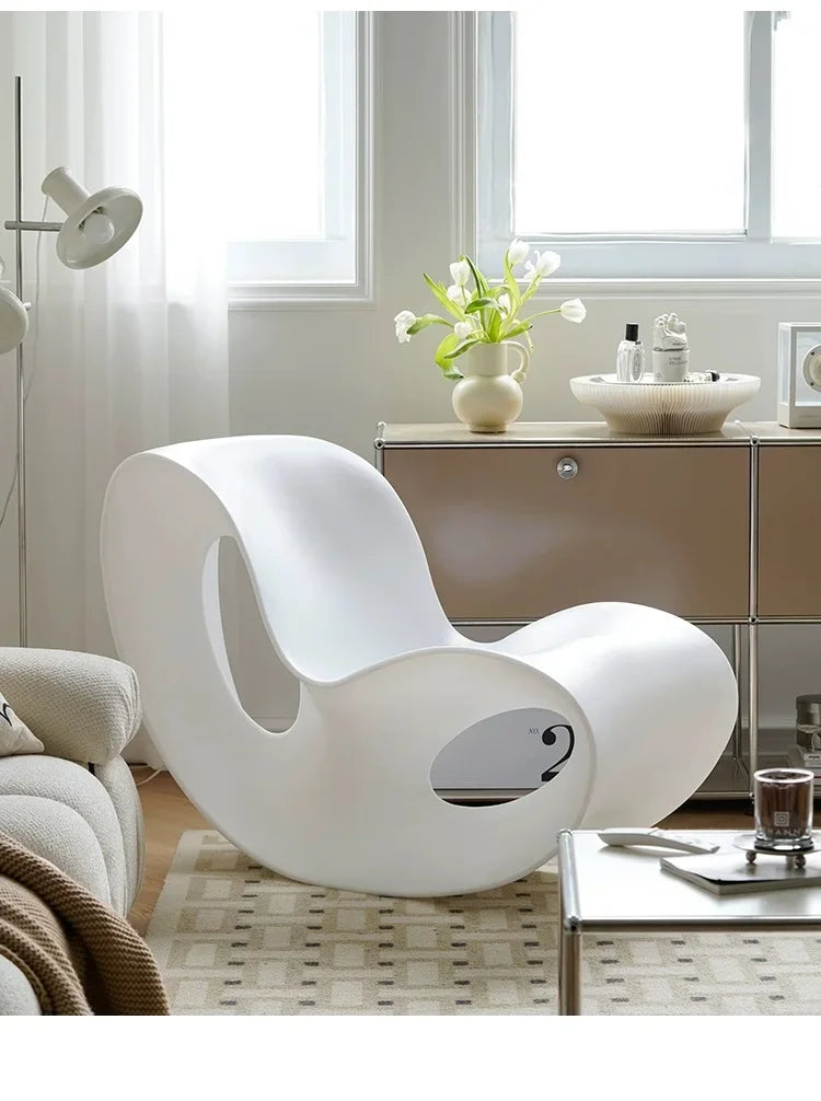 Modern MC THE BLACK DIAMOND rocking lounge chair made of durable PE plastic, featuring a sleek post-modern design for home relaxation.